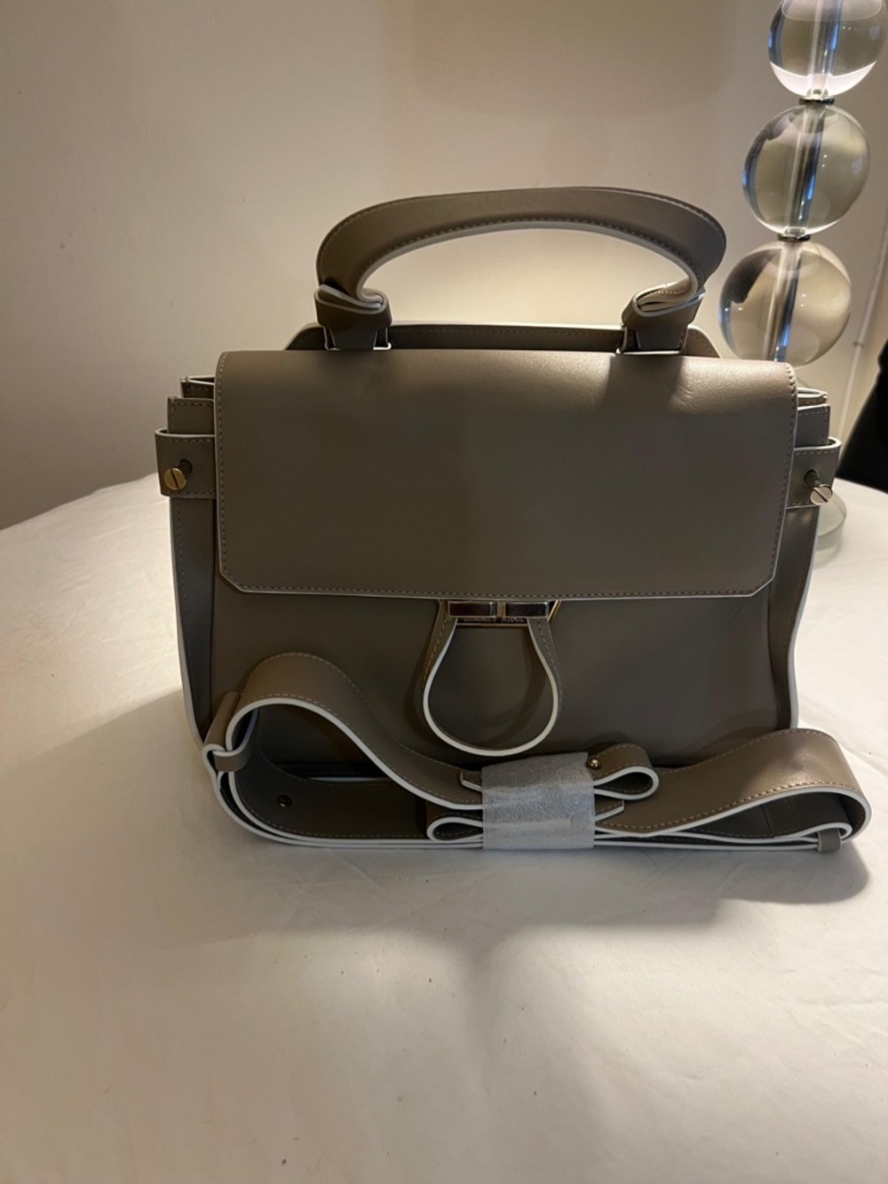 Neutral Gray Structured Satchel with Top Handle and Detachable Strap